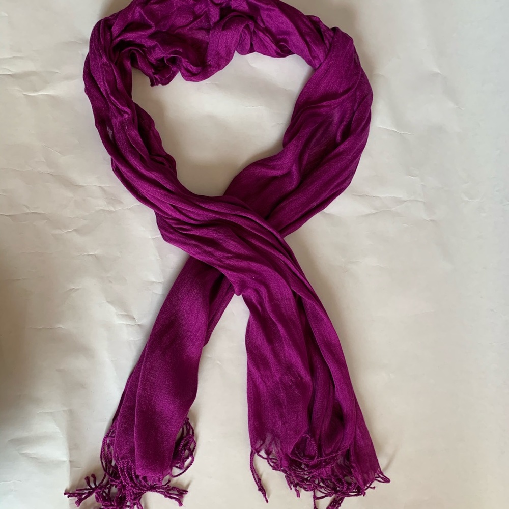 Fuchsia scarf with tassels at bottom